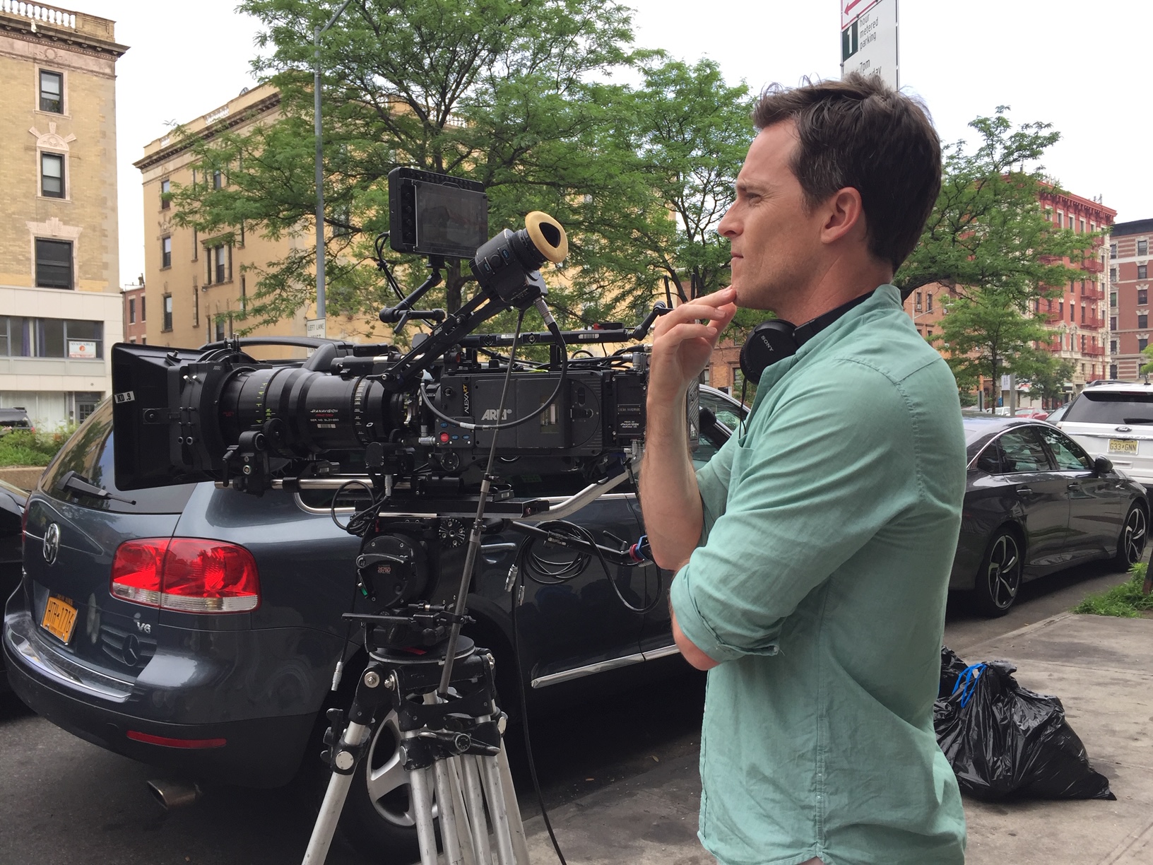 Director Mike Doyle behind the camera on set